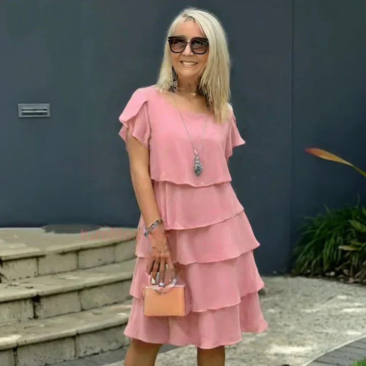 Robe fluide femme très confortable avec volants, parfaite pour le printemps. Style chic et décontracté mode femme.