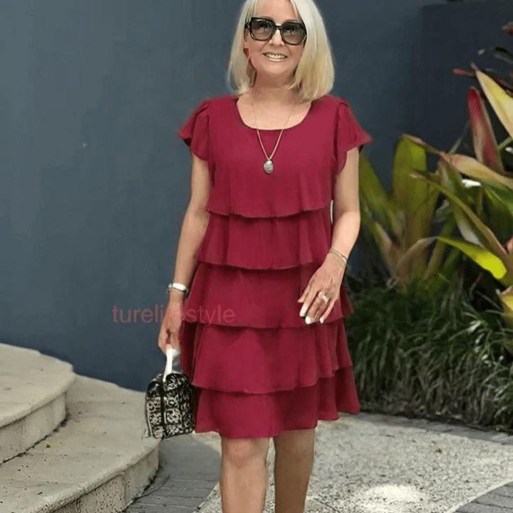 Modèle de robe fluide femme à volants, élégante et décontractée. Parfaite pour un look chic et confortable cet été.