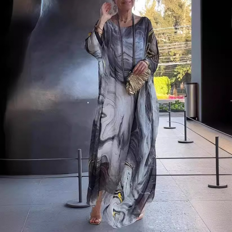 Élégante robe longue en chiffon fluide pour femme, légère et confortable, style mode estival.