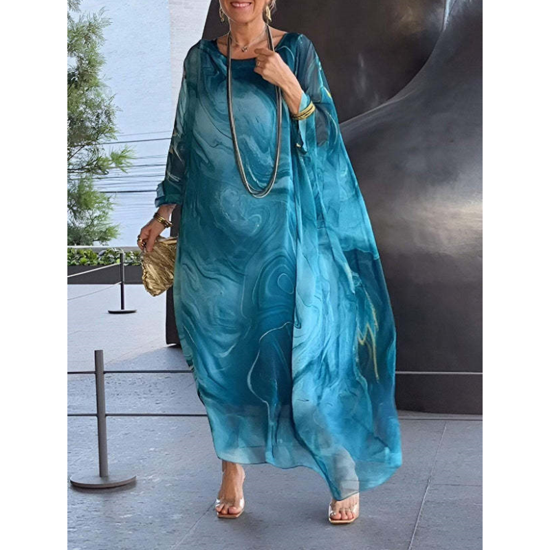 Robe femme longue et fluide en chiffon, élégante et décontractée, un essentiel léger pour l'été.