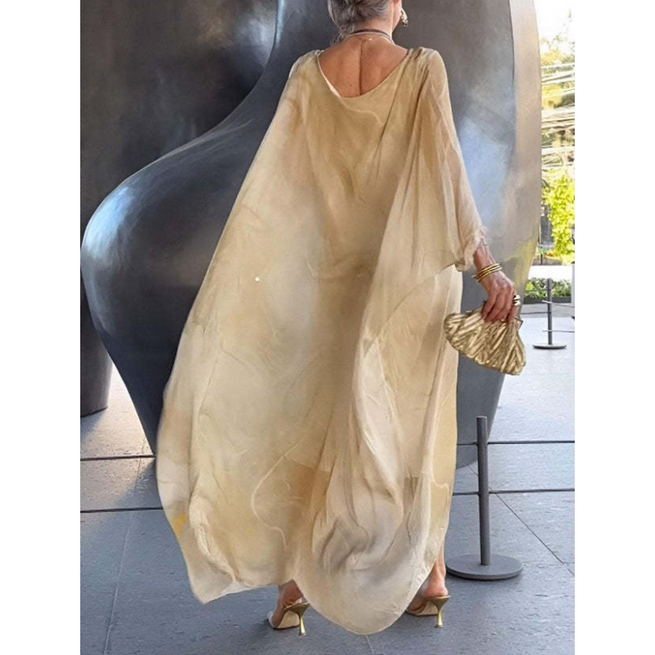 Confortable robe longue fluide en chiffon pour femme, parfaite pour l'élégance estivale et les vacances.