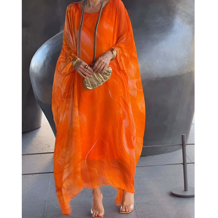 Robe de mode femme, longue, fluide et légère en chiffon, élégante pour les soirées d'été.