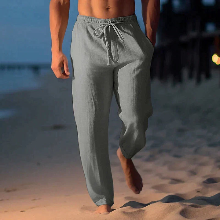 Découvrez le pantalon d'été décontracté ample pour hommes avec taille élastique, en lin frais et respirant.