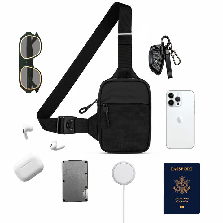 Sac de voyage compact noir pour homme, offrant une organisation optimale de vos affaires personnelles.