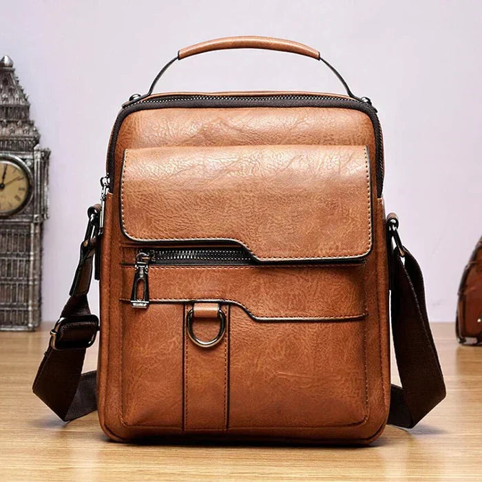 Sac à bandoulière unisexe en cuir PU, design épuré, idéal pour vos déplacements.