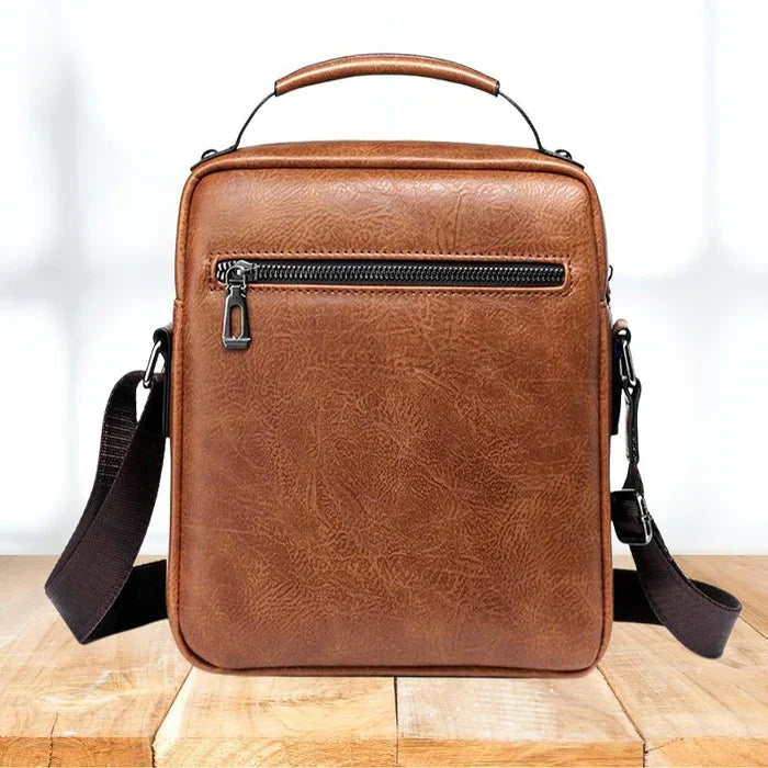 Sac moderne en cuir PU noir, bandoulière robuste, parfait pour un style urbain.