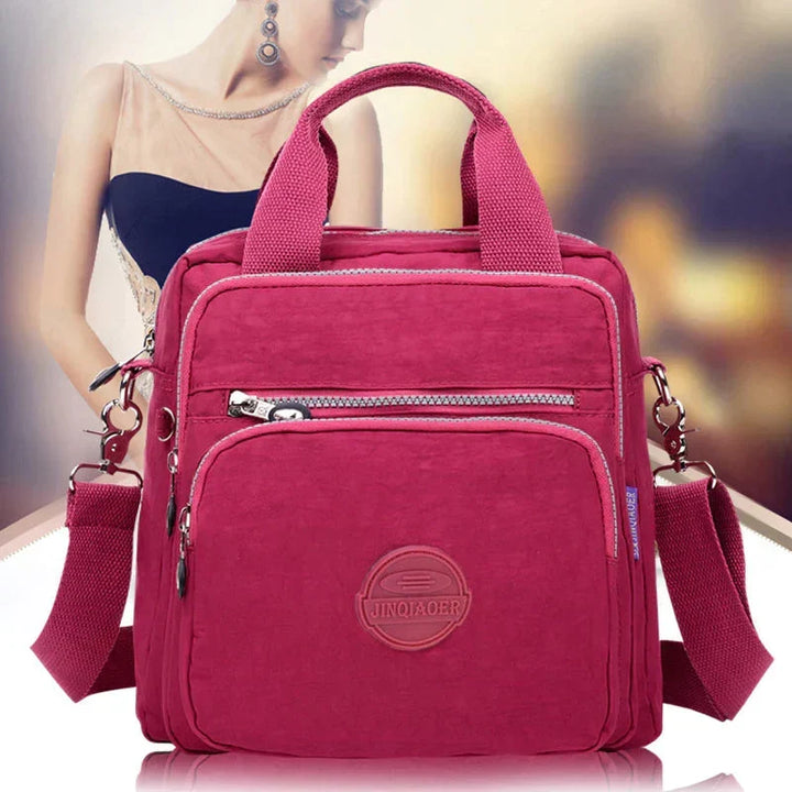 Sac à dos femme étanche élégant, idéal pour le quotidien ou le voyage. Rangement organisé et moderne.