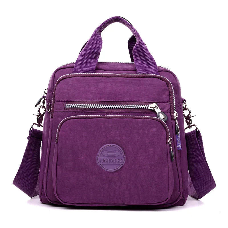 Sac à dos femme élégant et étanche, design intemporel, idéal pour toute occasion.