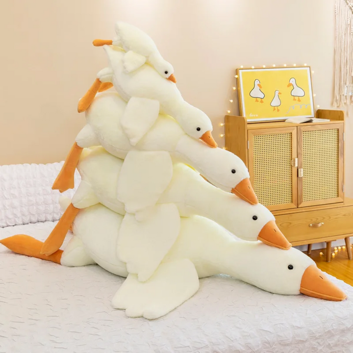 Joyeuse peluche oie géante, coussin douillet pour bébé, enfant. Parfait jouet doux anti-stress et décoration chambre.