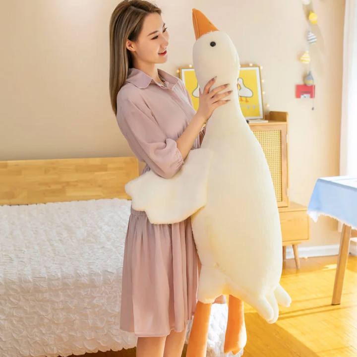 Peluche oie géante, coussin réconfortant. Un cadeau doux idéal pour bébé, enfant ou adulte, ajoutant chaleur.
