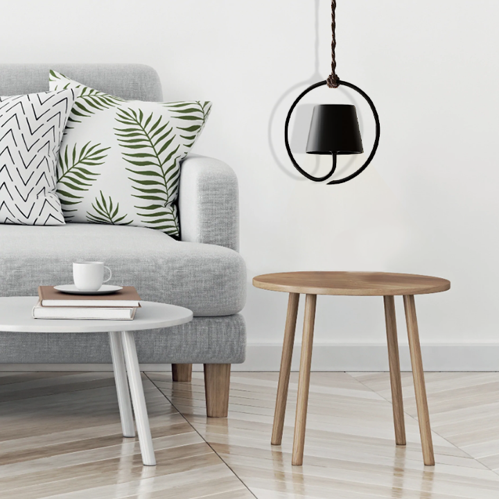 Éclairage suspendu minimaliste blanc, rechargeable et sans fil, parfait pour décor intérieur/extérieur.