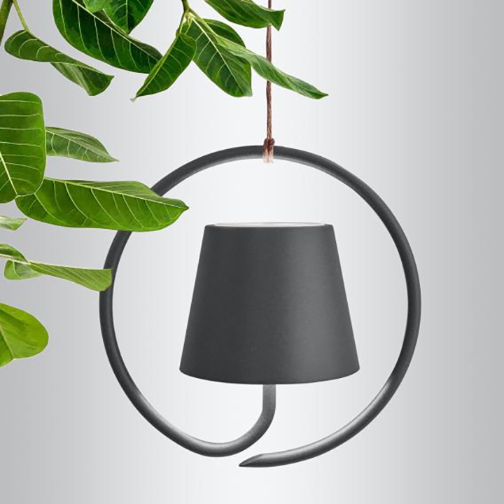 Éclairage design minimaliste blanc, suspension LED rechargeable sans fil, crée une ambiance moderne et épurée.