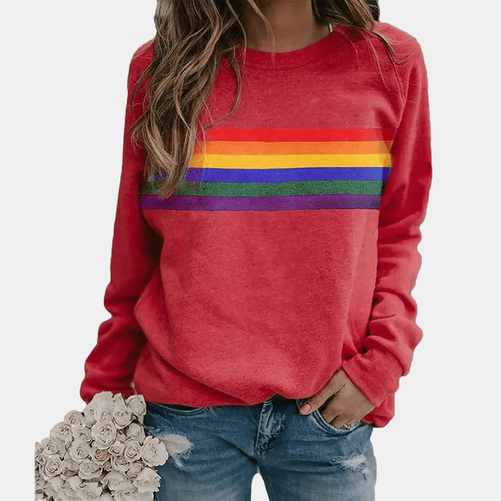 Détail du sweat-shirt femme à rayures colorées: tissu doux et finitions élégantes. Confort moderne et style mode.
