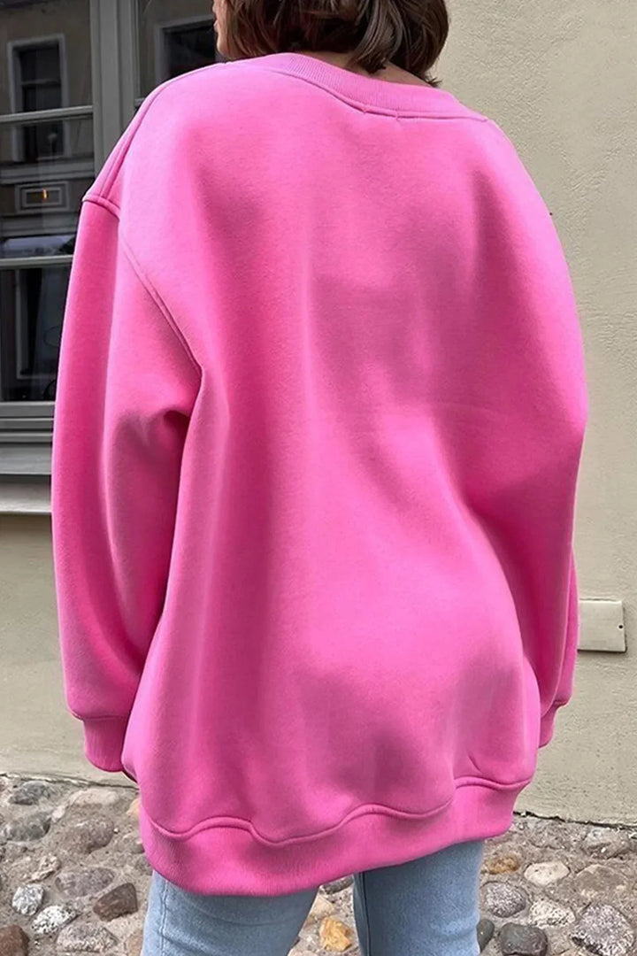 Sweatshirt mode femme oversize, col rond, couleur unie, parfait pour le printemps.