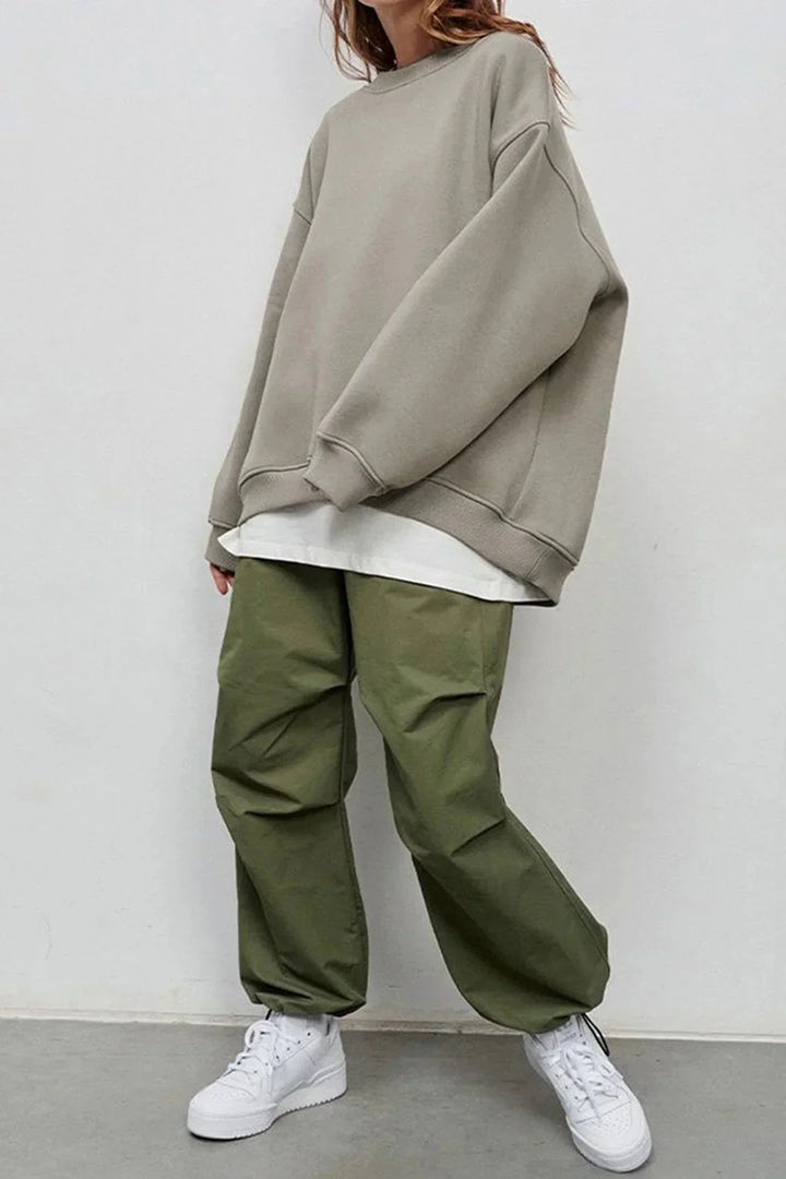 Adoptez le confort avec ce sweatshirt femme oversize, col rond, parfait pour l'automne.