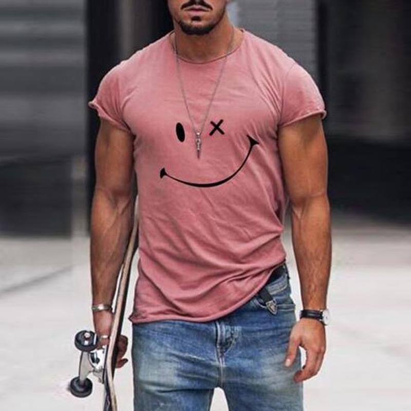 T-shirt homme gris, coupe classique. Motif smiley joyeux pour un confort quotidien et une touche d'optimisme.