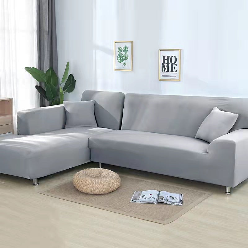 Housse canapé douce et confortable. Extensible, idéale pour un salon cosy et protégé. Ameublement douillet.