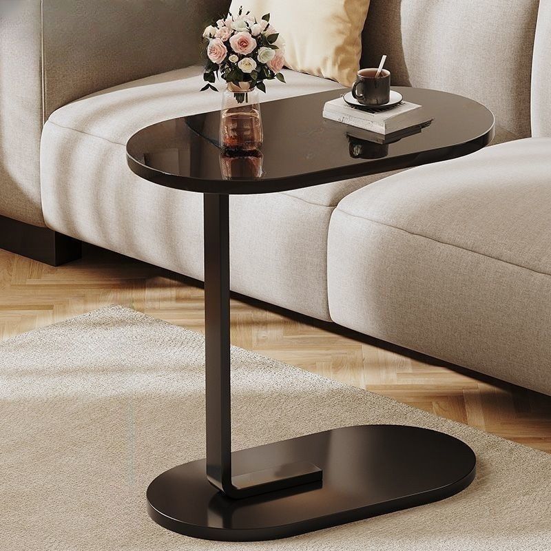 Élégante table d'appoint pliable en bois clair et structure métal noir, style scandinave pour intérieur optimisé.