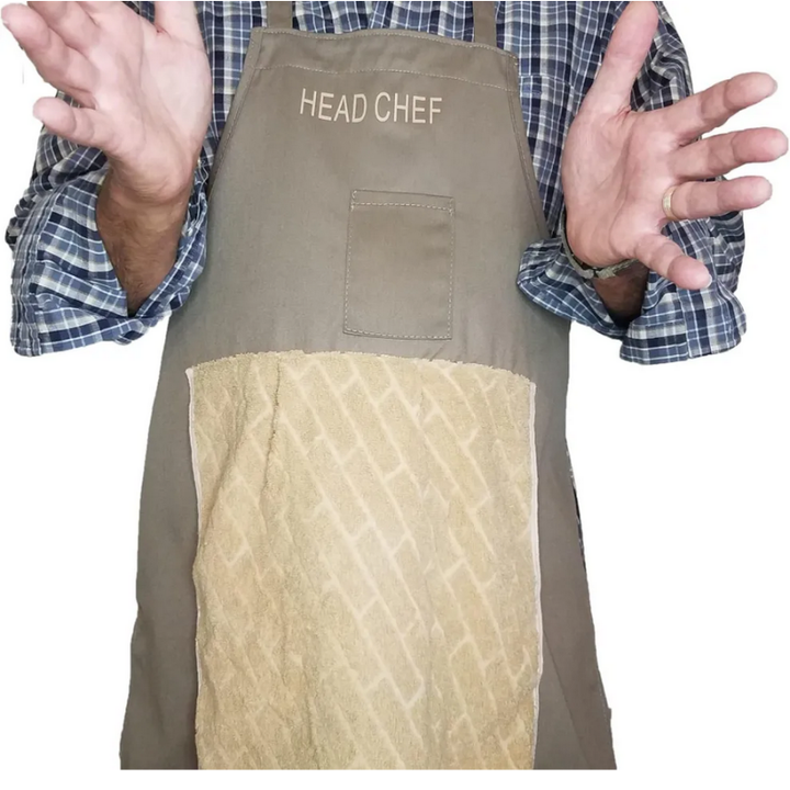 Tablier de cuisine humoristique marron, conçu pour les fêtes et barbecues. Polyester, unisexe, accessoire original.