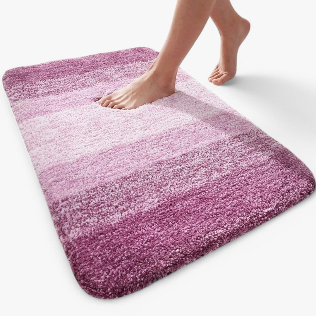 Tapis de bain microfibre ultra-doux, confort luxueux pour pieds mouillés, antidérapant et très absorbant.