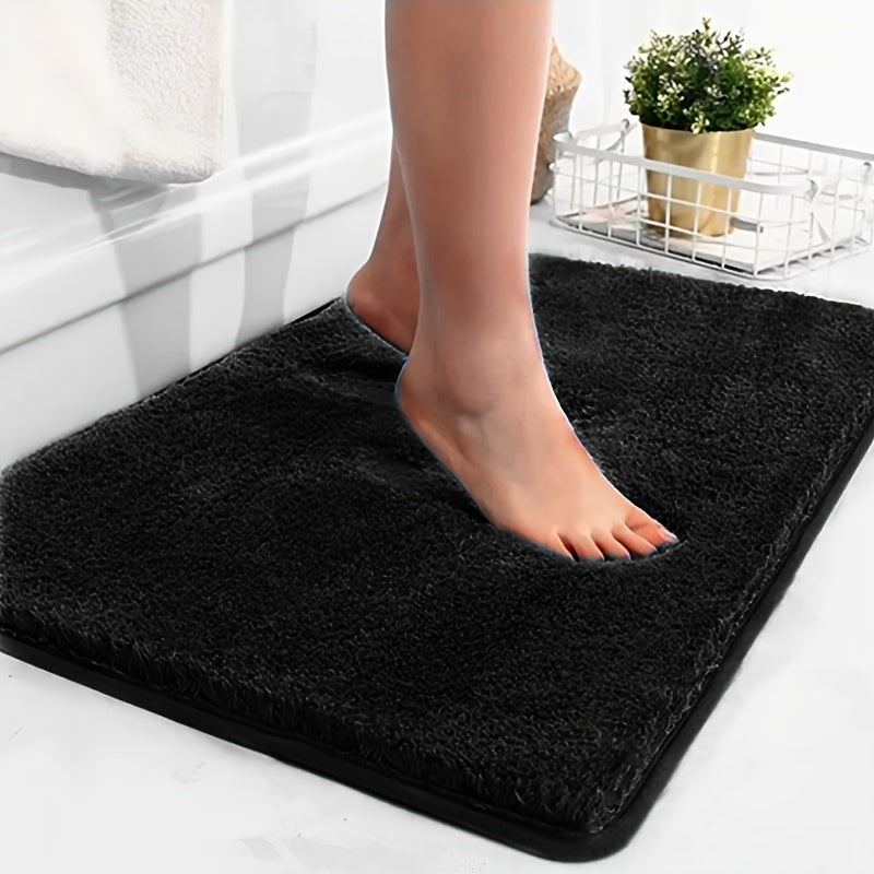 Tapis de bain antidérapant pour salle de bain, matelassé pour plus de confort et sécurité. Design moderne et facile d'entretien.