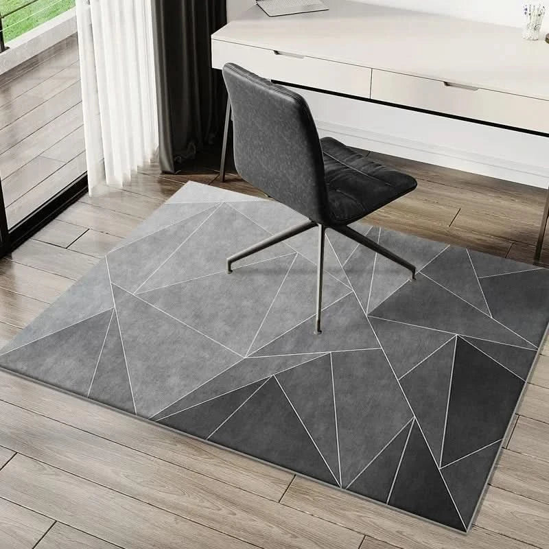 Tapis rond lavable gris pour chaise de bureau, protège les sols durs et décore l'espace de travail.