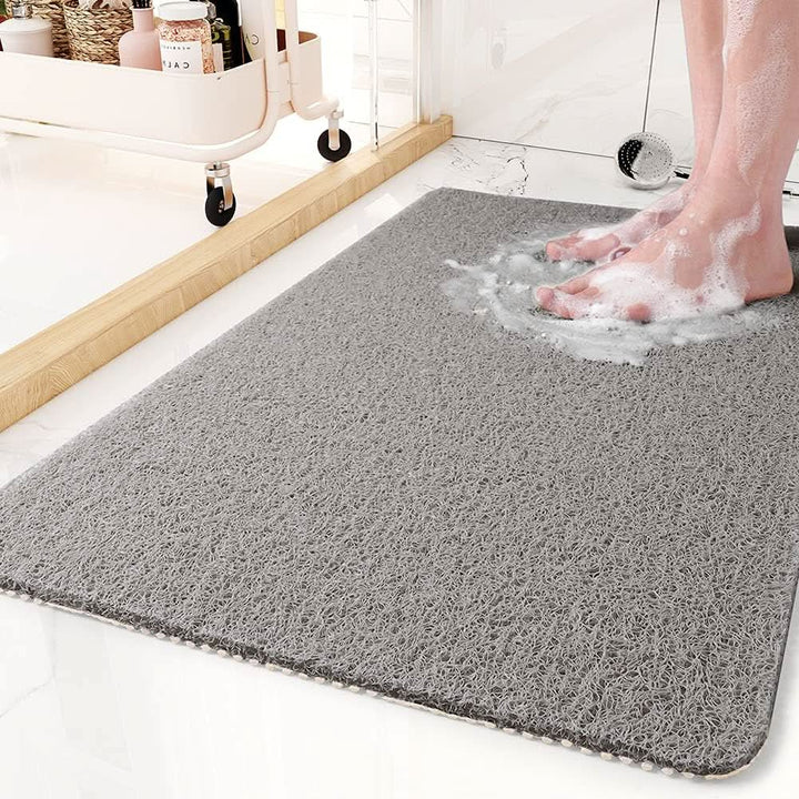 Tapis de douche antidérapant en PVC pour une sécurité maximale, prévient les chutes dans la salle de bain.