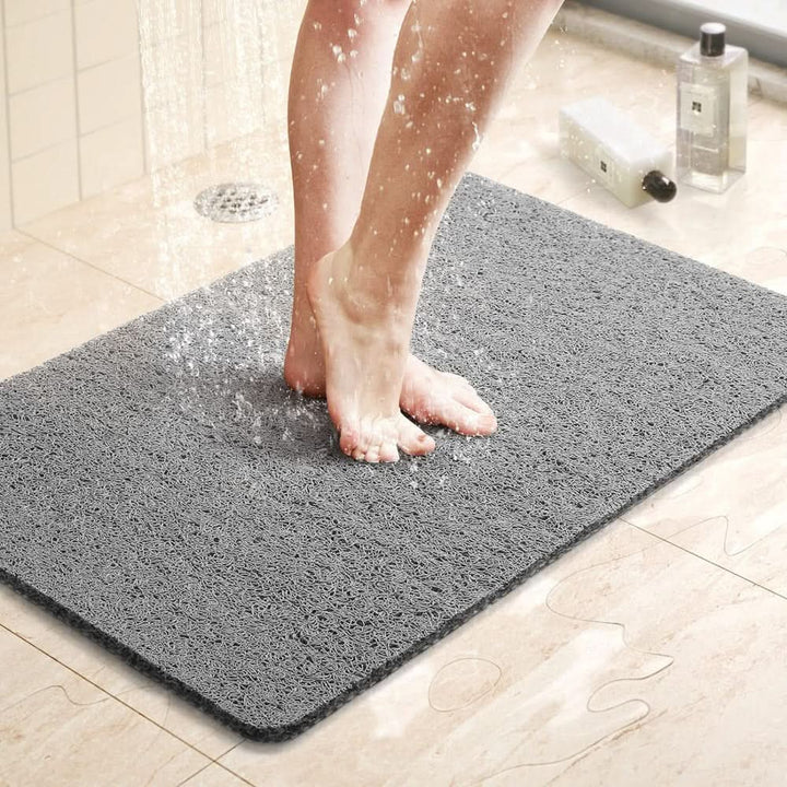Tapis de douche antidérapant pour salle de bain, assure sécurité, confort et hygiène optimale sous la douche.