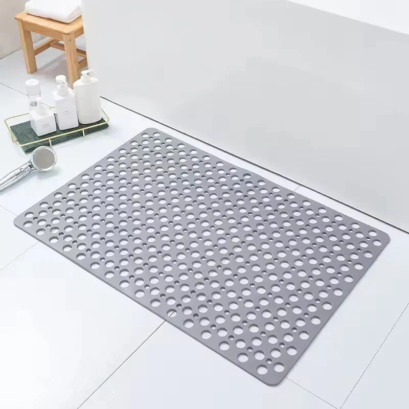 Tapis de douche antidérapant avec ventouses, assurant sécurité et stabilité optimale dans la salle de bain, prévenant les chutes.