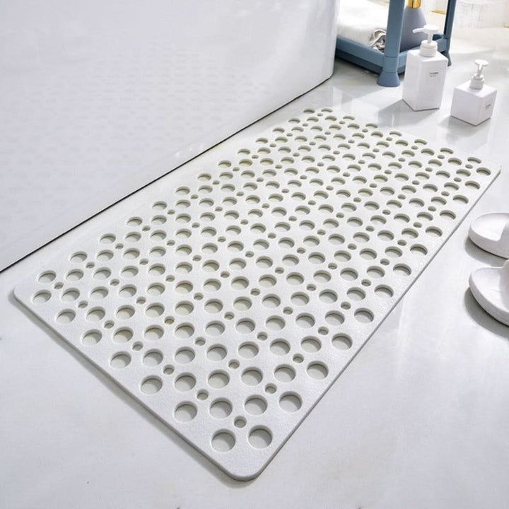 Sécurisez votre douche avec ce tapis antidérapant à ventouses fortes, prévient les glissades et assure l'hygiène.