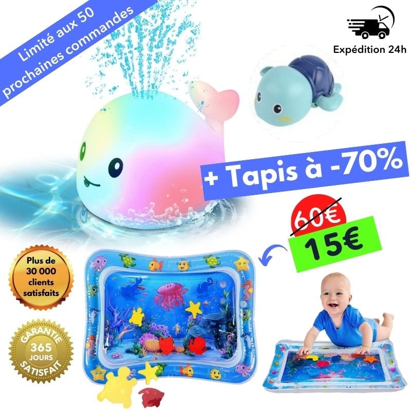 Enfant jouant avec la baleine lumineuse dans le bain, un jouet d'eau éducatif pour un plaisir aquatique.