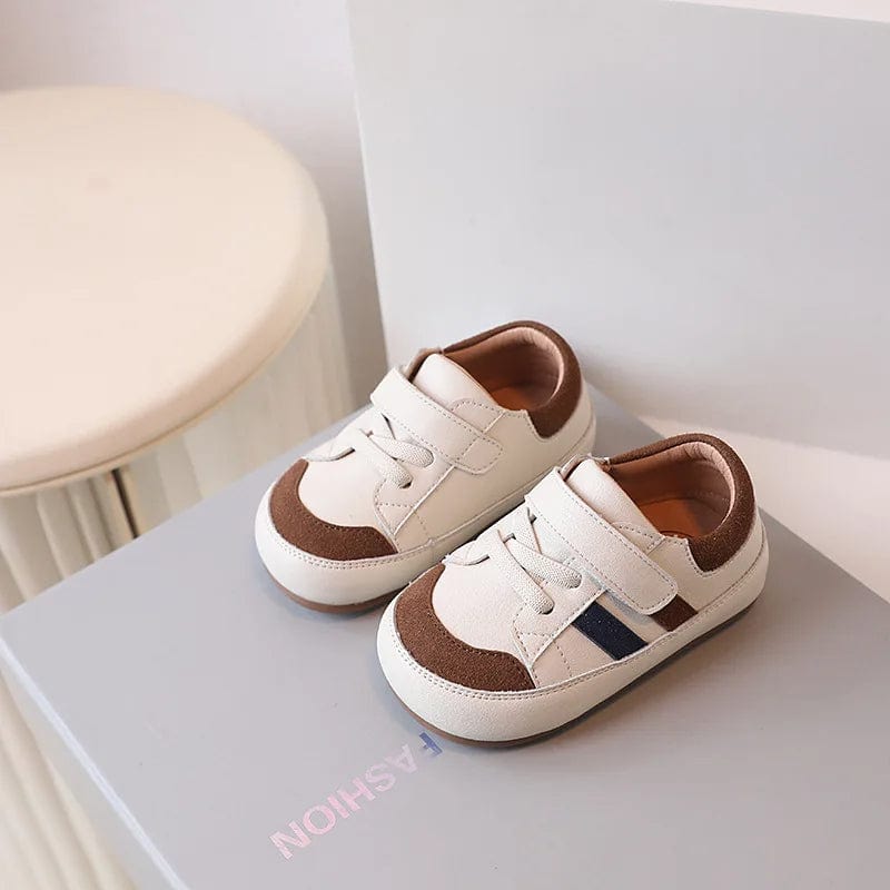 Chaussures premiers pas souples et respirantes, favorisant le développement naturel du pied de bébé.