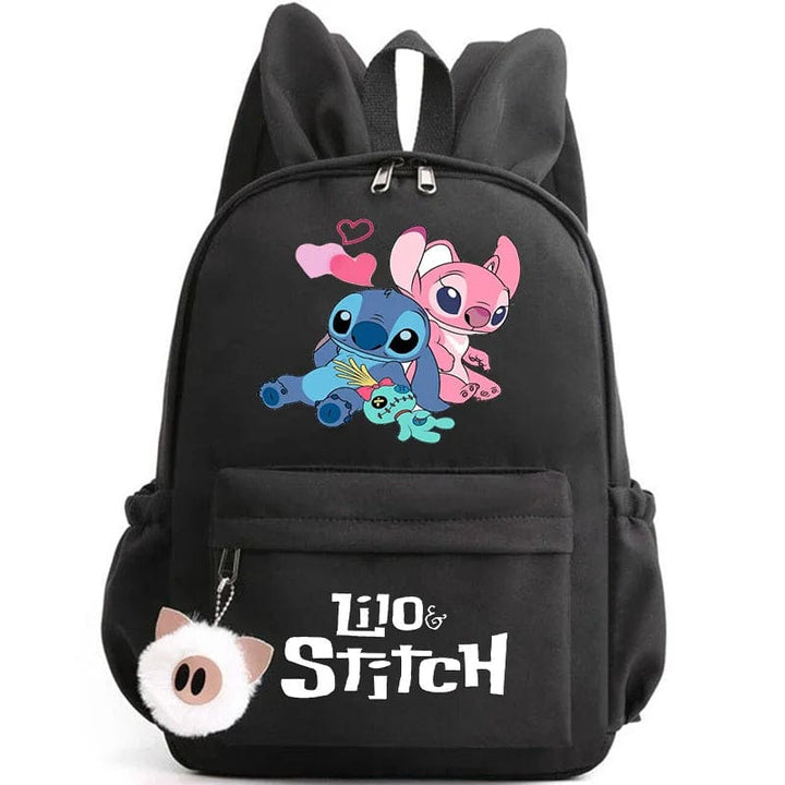 Cartable rentrée enfant, avec poignée supérieure et porte-clés attachable.