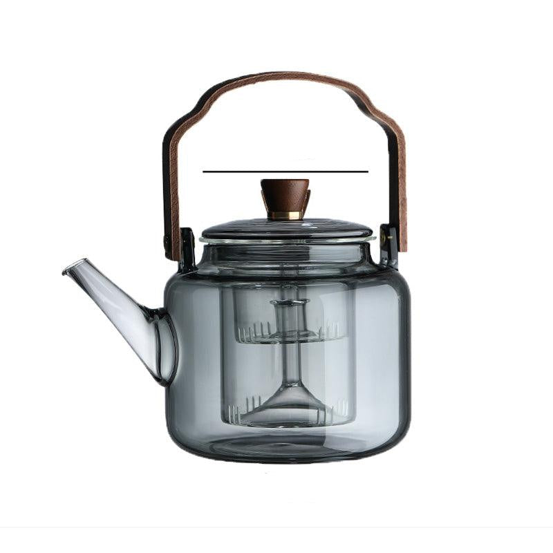 Théière moderne et élégante en verre et bois, capacité 1,2L, parfaite pour tout type de thé.