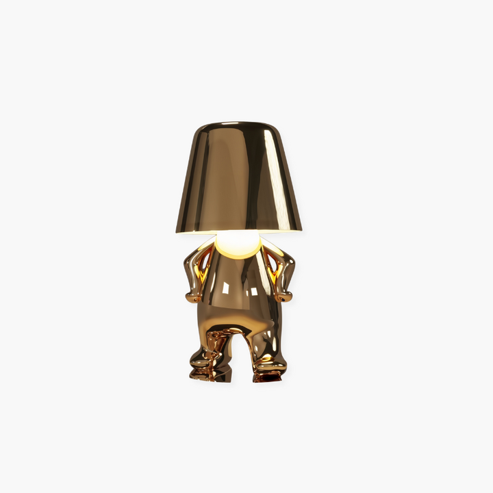 Lampe d'appoint Le Penseur dorée et sans fil, éclairage LED artistique pour tout espace.