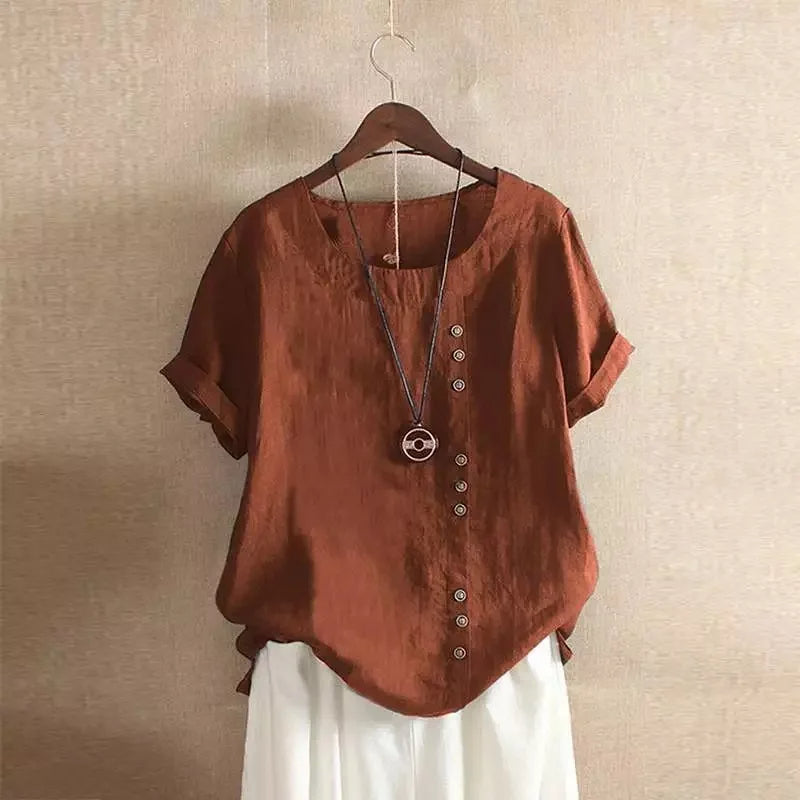 Top femme polyvalent, manches courtes, confortable avec boutons. Parfait pour l'été et un look décontracté chic.