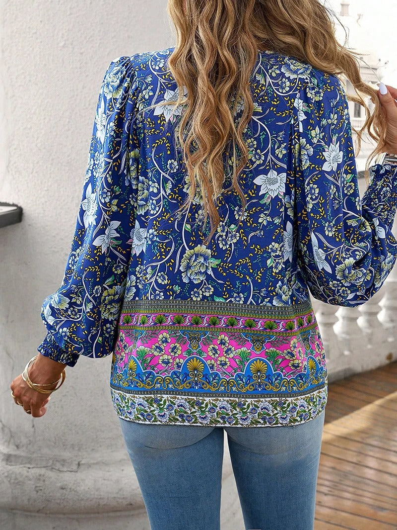 Top fleuri d'été pour femme, motifs floraux vifs. Blouse légère et confortable, parfait pour un style frais et décontracté.