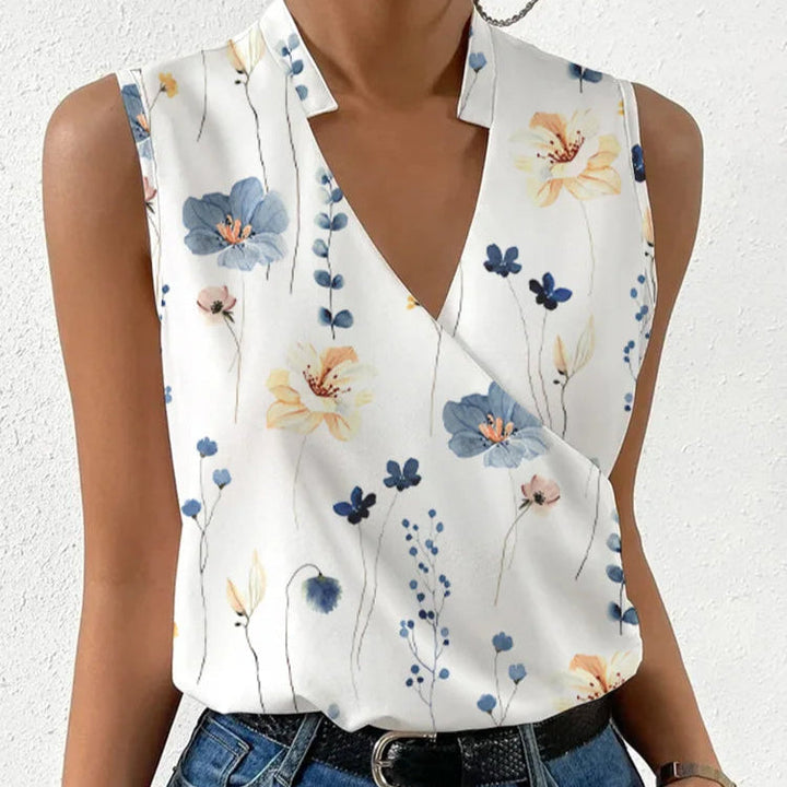 Chic top femme fleuri sans manches, col V, parfait pour un look décontracté ou élégant en été.