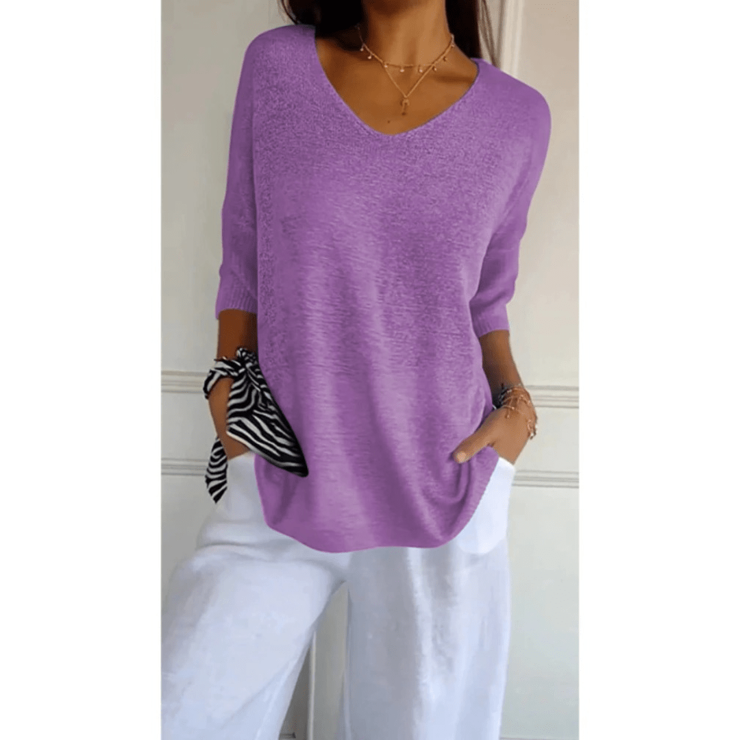 Top femme décontracté chic, col V et manches 3/4. Confort optimal pour la tenue quotidienne mode femme.