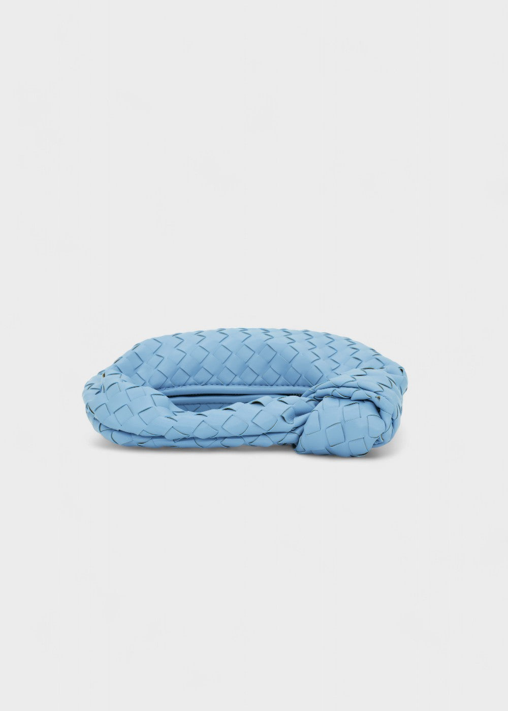 Sac à main mini tressé en similicuir, un accessoire chic et intemporel pour la femme moderne.