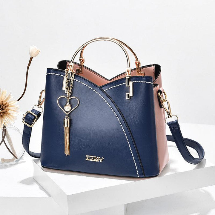 Grand sac fourre-tout en cuir pour femme, moderne et élégant, offrant une excellente organisation interne.
