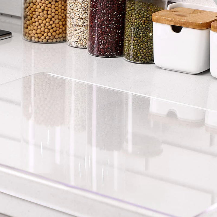 Planche à découper transparente au design moderne et antidérapant, parfaite pour une préparation des aliments sûre.