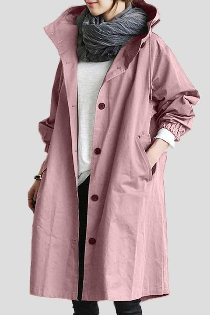 Trench de pluie femme, veste élégante et fonctionnelle avec ceinture, pour un look habillé et protecteur.