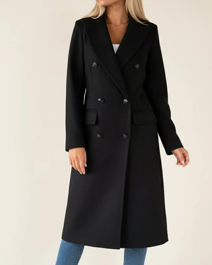 Trench long classique femme, coupe élégante et structurée. Manteau chic et polyvalent pour la mode féminine.