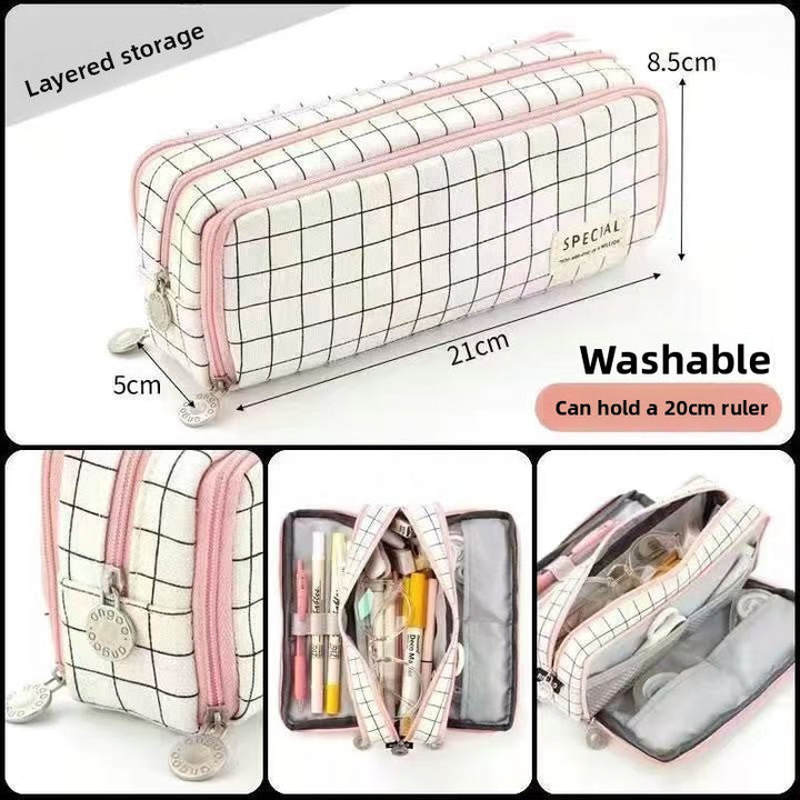 Organisation facile: trousse scolaire double compartiment pour toutes les fournitures.