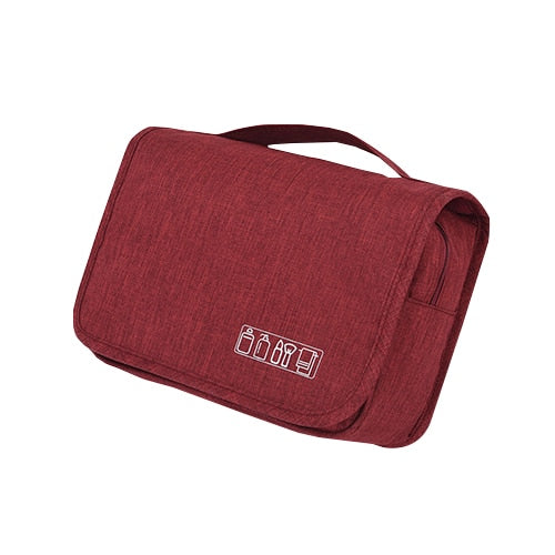 Organisateur de voyage suspendu bleu. Trousse de toilette étanche pour cosmétiques, accessoires et articles d'hygiène.