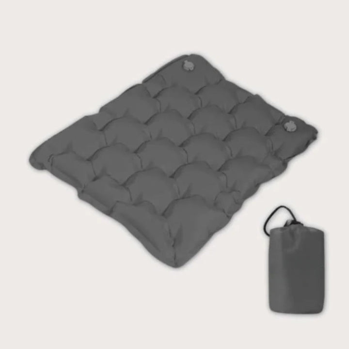 Coussin de siège gonflable ultra-léger pour camping et randonnée, offrant confort portable et étanche.