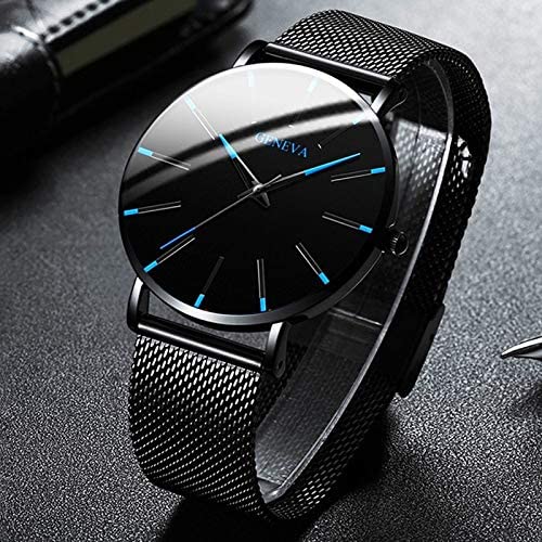 Montre homme ultra-fine élégante, cadran minimaliste noir, boîtier acier inoxydable.