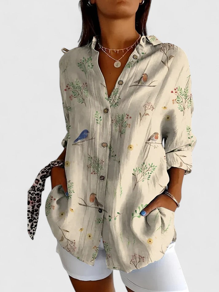 Blouse femme fluide à imprimé floral, un top élégant et lumineux. Idéale pour une tenue décontractée chic.