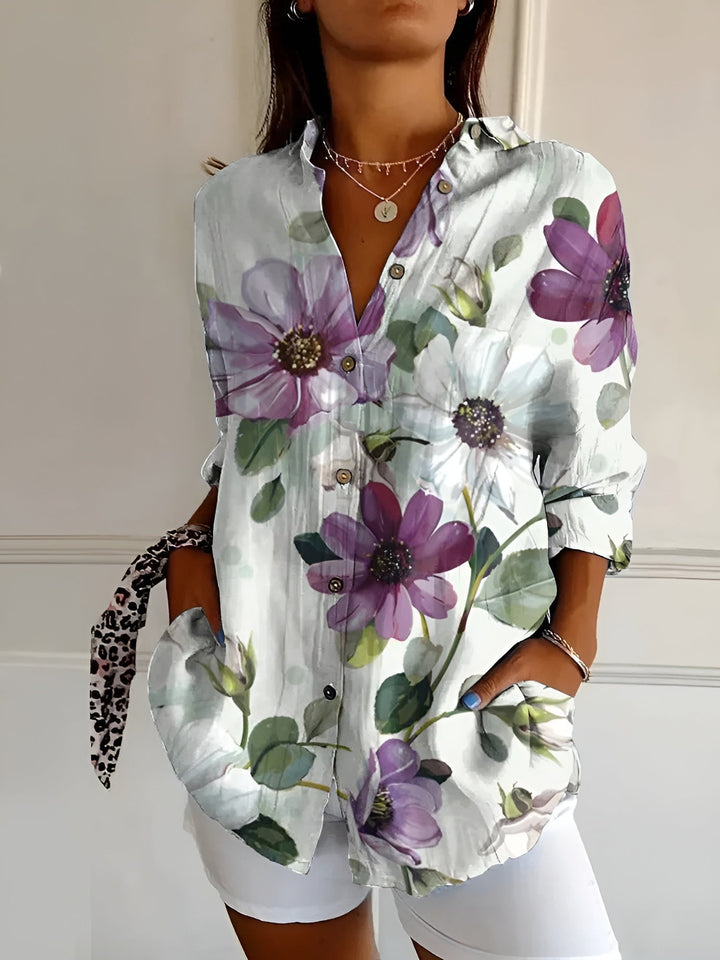 Blouse femme chic et élégante à manches longues, coupe fluide. Parfaite pour le bureau ou tenue décontractée.